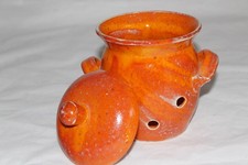 oranger Knoblauchtopf