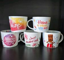 Kinder Riegel Sammeltassen verschiedener Jahrgänge