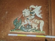 Gusseisernes Wandrelief -