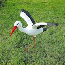 Mittelgroßer fliegend storch - fliegend,