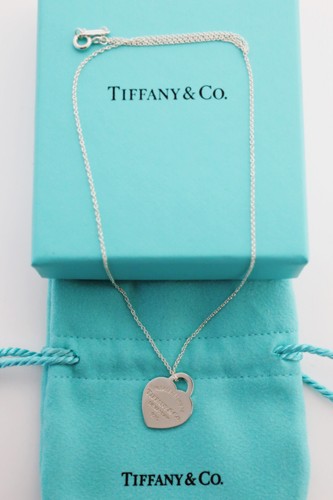 Tiffany please return to - &, co