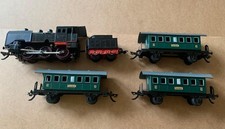 Zeuke Spur 0 umgebaute T 48 mit Kohlewagen und drei Donnerbüchsen.