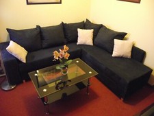 Wohnlandschaft mit Kissen Schlafsofa Couch blau Gästebett Sofa Couch