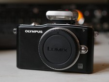 Olympus PEN Mini E-PM1 +