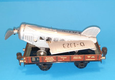  B0219799170 - Märklin Niederbordwagen 1772 mit Blechflugzeug D-1929 Spur 0 Gute