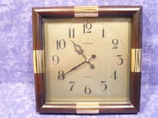 Dugena Wanduhr Quartz Holz mit Messing zeitloses Design 1980er Jahre 24cm x 24cm