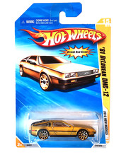 ✅  Hot Wheels '81 DeLorean DMC-12 in OVP * 2010 New Models * Satin Gold * MOC