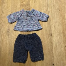 Handgestrickte Kleidung f