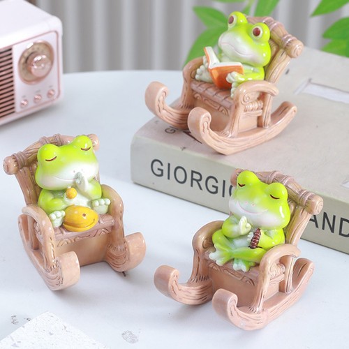 Kreativer schaukelstuhl frosch - kreativer,