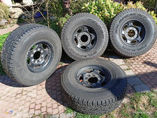 4 neuwertige Reifen auf Alufelgen 265/75/16 Ford F250 Excursion