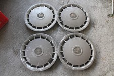 4 x  BMW 36.13-1129843 15 ZOLL RADKAPPEN, KAPPEN