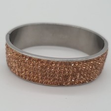 Snö of Sweden Armreif Pfirsichfarben rosa Edelstahl klappbar