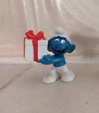 Schlumpf mit Geschenkpaket