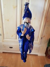 Große Marionette, Zauberer