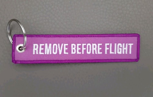Remove before flight lila - remove,