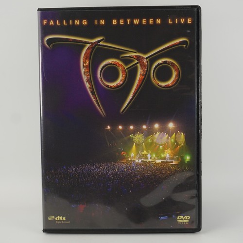 Toto falling between - toto,