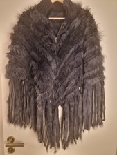 Blauer Poncho mit Fransen