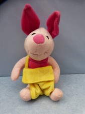 25254. Ferkel mit Tasche