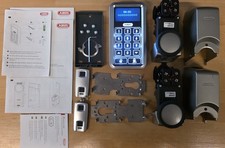 2x Abus Home Tec Pro Funk-Türschlossantriebe, Funk Tastatur, x2 Fernbedienungen.