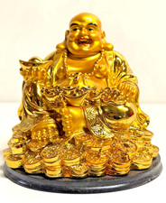 Goldene Glücksfigur –