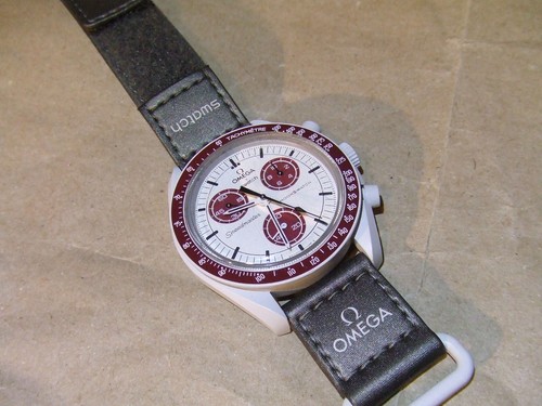 Omega swatch speedmaster - ×,