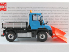 Busch 50923 Mercedes-Benz Unimog U 430 (2013) mit Spitzpflug 1:87/H0 NEU/OVP 