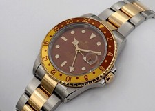 ROLEX OYSTER PERPETUAL GMT MASTER II TIGER EYE STAHL/18k REF.: 16713 PAPIERE/BOX