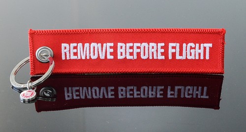 Remove before flight by - remove,