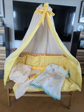 Baby-Beistellbett aus Holz mit