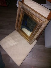 Antiker Spiegel mit Goldrahmen