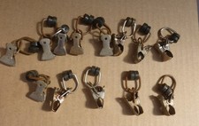 13 Stück alte Gardinenhalter