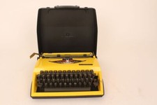 Triumph Tippa Kofferschreibmaschine Reiseschreibmaschine gelb 70er Jahre vintage