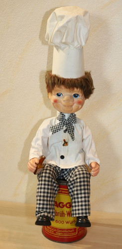 Werbefigur mit blechdose maggi - werbefigur,