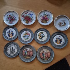 11 x Untersetzer (7x Zinn mit Motiv und 4 x Porzellan) versch. Motive