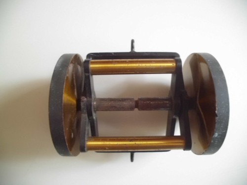 Antike angelrolle aus messing - aus,