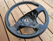 02-06 NEW LEATHER STEERING