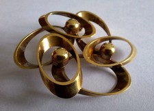 Brosche Geschwungene Ringe