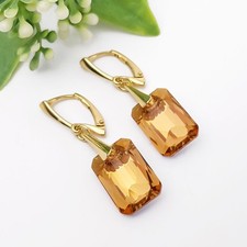 Goldene ohrringe Swarovski