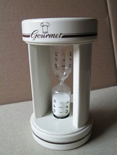 Eieruhr Sanduhr  Kunststoff  rund  weiß  Aufschrift -  Laufzeit  von  3 - 5 Min.