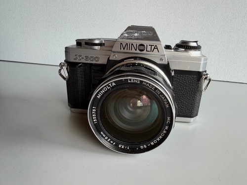 Minolta 300 spiegelreflex - x,