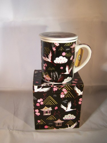 Teetasse mit sieb und - teetasse,