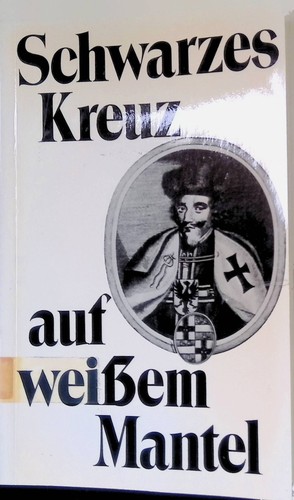 Schwarzes kreuz auf - auf, weißem