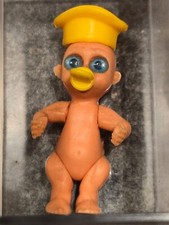 Babys spielende Berufe Koch in gelb ohne Besteck