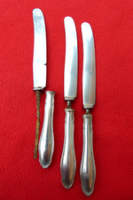 3 beschädigte Menümesser