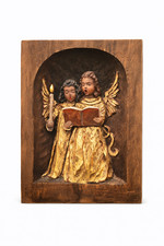 Handgeschnitztes Holzrelief