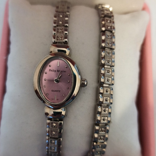 Damenuhr und armband von - und,