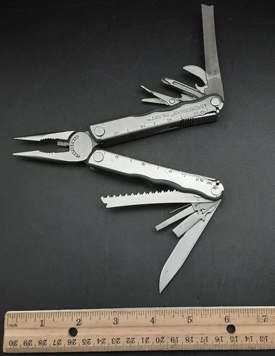 Retired stainless leatherman - stainless,