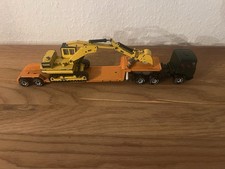 Siku MAN LKW Umbau mit Anhänger und NZG  Bagger 1:55