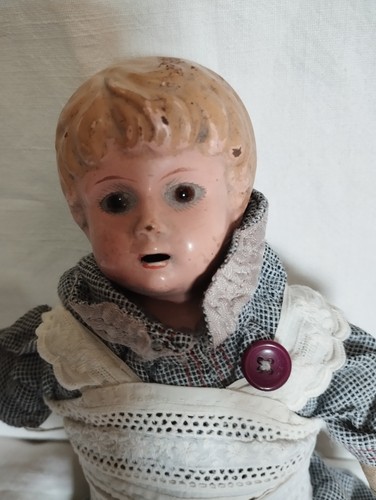 Kleine metall kopf - puppe, 20