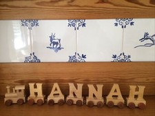 Namensgeschenk "Hannah" Holzbuchstaben als Eisenbahn 7-teilig